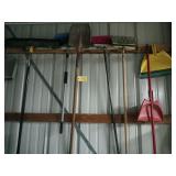 Push brooms hand brooms dustpans and one shovel