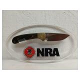 National rifle association Buck knife 3" on wall