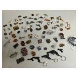 Large assortment of gun / police pins, k