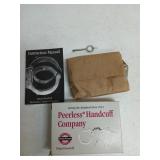 Peerless handcuffs, new w/ 2 keys