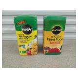 Two full containers of miracle grow