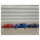 3 diecast cars