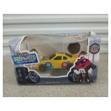 M&Ms under the hood chocolate candy dispenser