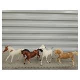 4 Breyer horses 5" - 7"