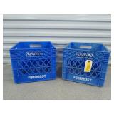 Two foremost milk crates