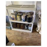 Two shelves full of paint, indoor and outdoor