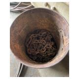 Bucket full of misc chains