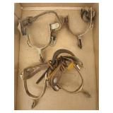 2 pair of spurs, a little crusty