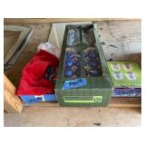 Three boxes of Christmas decor, stockings, mugs,