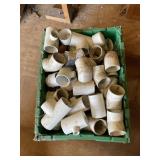 Box of new PVC fittings