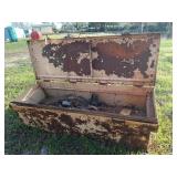 Crusty toolbox with chokers, jumper cables, etc