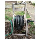Oldsmobile rolling hose reel w/ 50+ ft of water