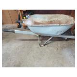 Metal wheelbarrow, has lots of character