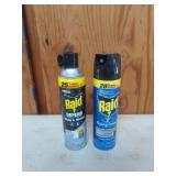 Two cans of Raid bug killer, both feel full