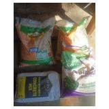 Two bags of River pebbles, one opened bag of