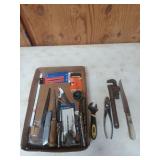 Assorted tools, mostly saw blades and drill