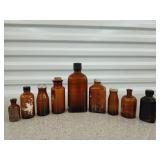 9 asst amber glass bottles