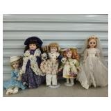 5 asst porcelain dolls