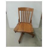 Rolling oak office chair