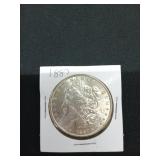 1887 Morgan silver dollar