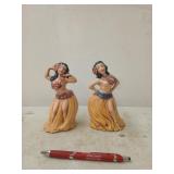 Pair of ceramic hula girls, one has a small chip