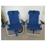 2 folding beach chairs