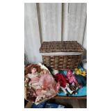 lined basket with lid with 6 porcelain dolls as