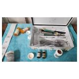 first aid metal box full of camping supplies