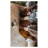 grolsch brown glass veer bottles with tops and