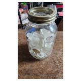 vintage canning jar full of glass chess pieces a