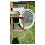 antique oval mirror with date stamp on the back