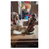 Native American Indian chief and maiden statues