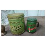 vintage metal tea canisters and pepper shaker
