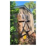 chicken coop and yard with one occupant chicken