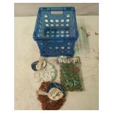 Small plastic crate of marbles, glass home decor