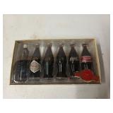 Evolution of the Coca-Cola contour bottle six