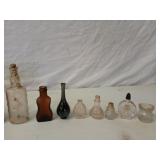 Box of assorted small glass bottles, salt and