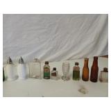 Box of assorted small glass bottles