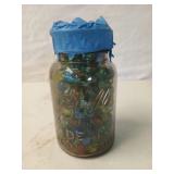 Ball jar full of assorted marbles