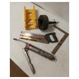 Drain snake, miter box, handsaw, framing square,