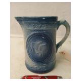 Pottery pitcher 8"