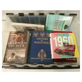 Plastic tote of assorted books