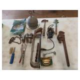 Pipe wrench, hand saws, hammer, trailer balls,
