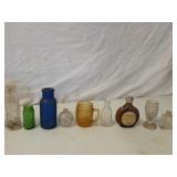 Box of assorted small glass bottles