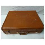 Samsonite suitcase full of assorted adult