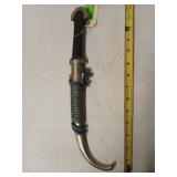 Knife in metal sheath