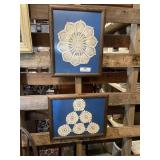 Two  Framed doilies behind glass. 16 x 12.