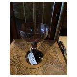 Amethyst  champagne shaped vase. 7 inches tall.