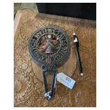 Wilton trivet.  "a stitch in time"