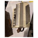 Ivory Cortini Accordion with leather carrying